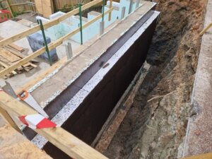 Clad with external insulation and waterproofing