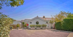 Number 23 from the driveway, an award-winning retrofit renovation bungalow made possible through an Ecology Renovation Mortgage